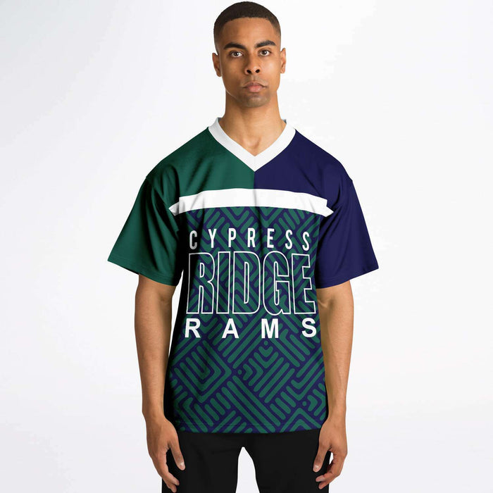 Black man wearing Cypress Ridge Rams football Jersey