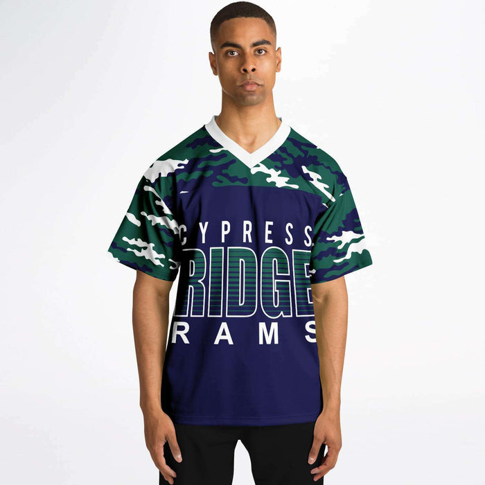 Black man wearing Cypress Ridge Rams football Jersey