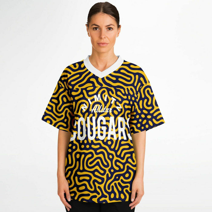 Women wearing Nimitz Cougars High School football jersey