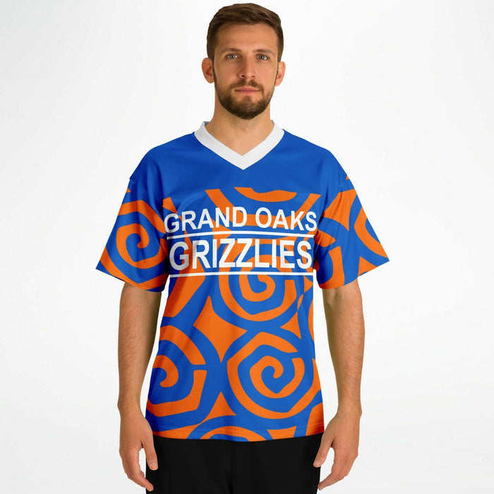 Man wearing Grand Oaks Grizzlies football jersey