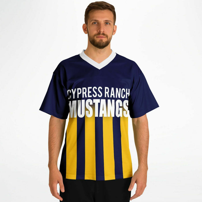 Man wearing Cypress Ranch Mustangs football jersey