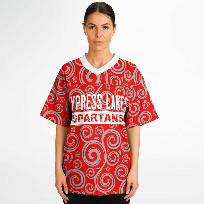 Women wearing Cypress Lakes Spartans football jersey