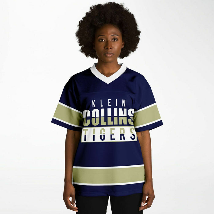 Black woman wearing Klein Collins Tigers football Jersey 13