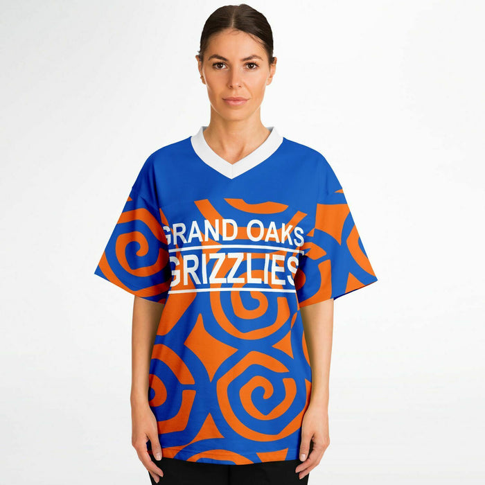 Women wearing Grand Oaks Grizzlies football jersey