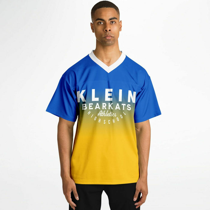 Black man wearing Klein Bearkats football Jersey