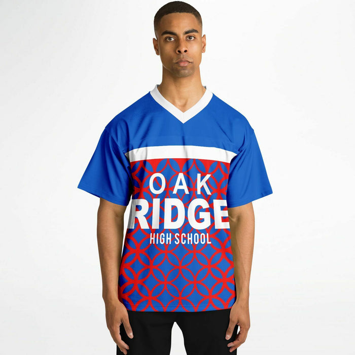 Black man wearing Oak Ridge War Eagles High School football Jersey