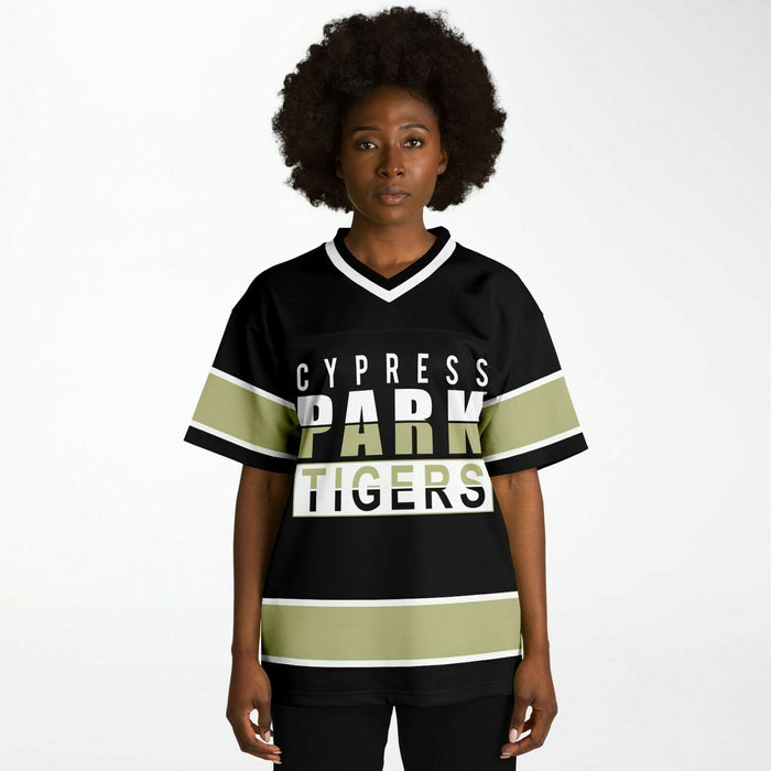 Black woman wearing Cypress Park Tigers football Jersey 13