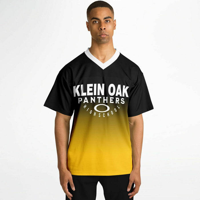 Black man wearing Klein Oak Panthers football Jersey