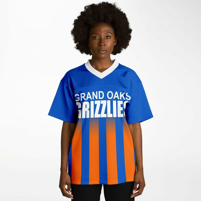 Black woman wearing Grand Oaks Grizzlies football Jersey