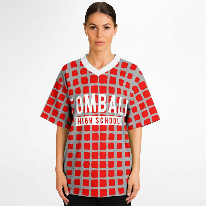 Women wearing Tomball Cougars High School football jersey