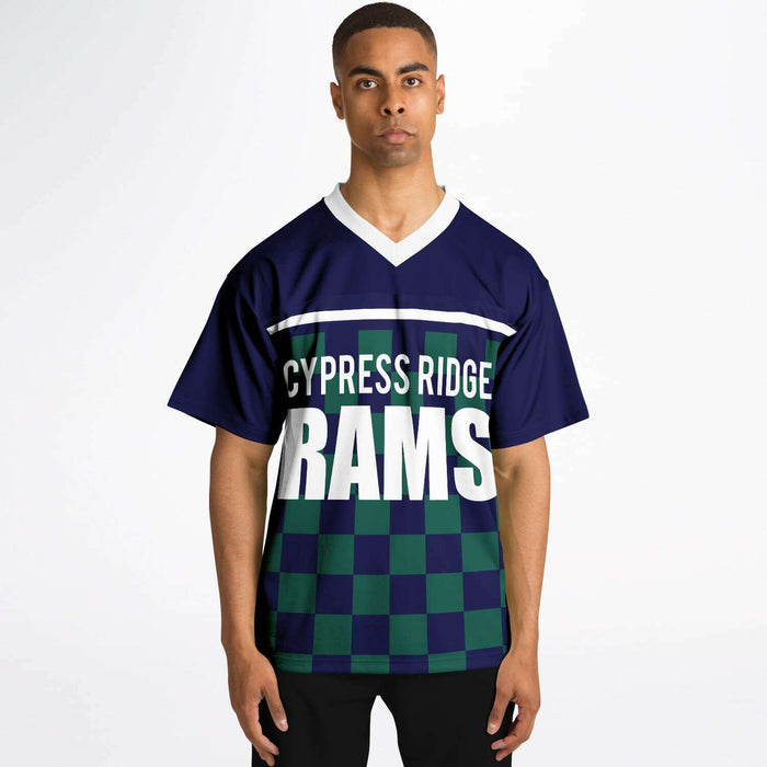 Black man wearing Cypress Ridge Rams football Jersey