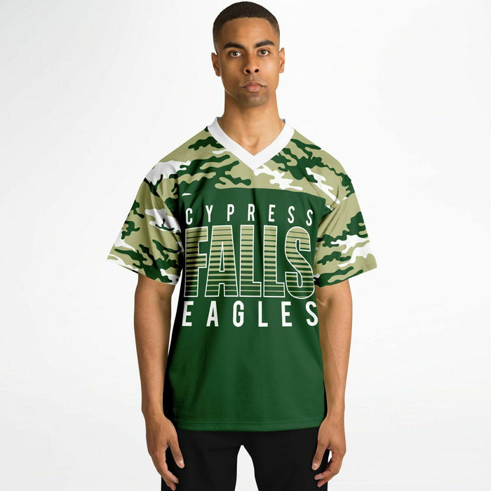 Black man wearing Cypress Falls Eagles football Jersey 08