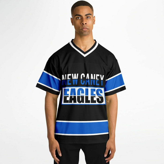 Black man wearing New Caney Eagles football Jersey 13