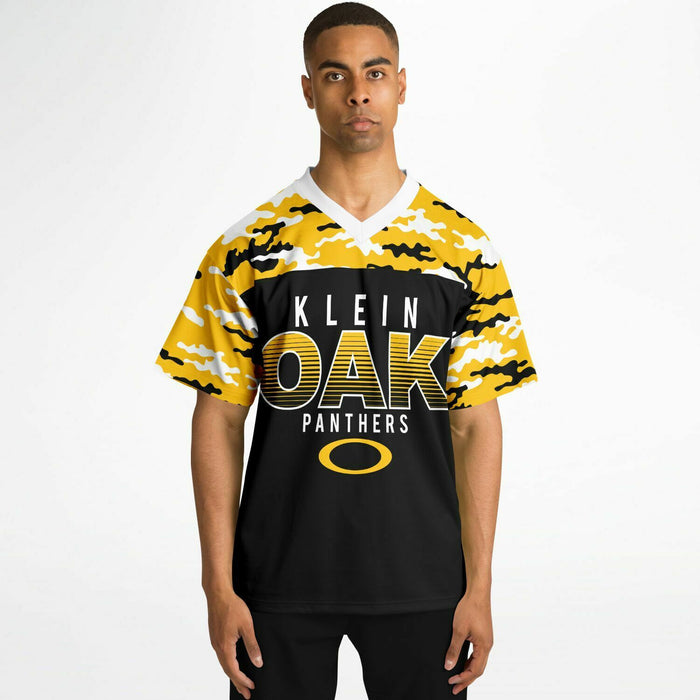 Black man wearing Klein Oak Panthers football Jersey