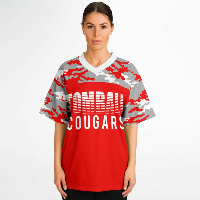 Women wearing Tomball Cougars High School football jersey