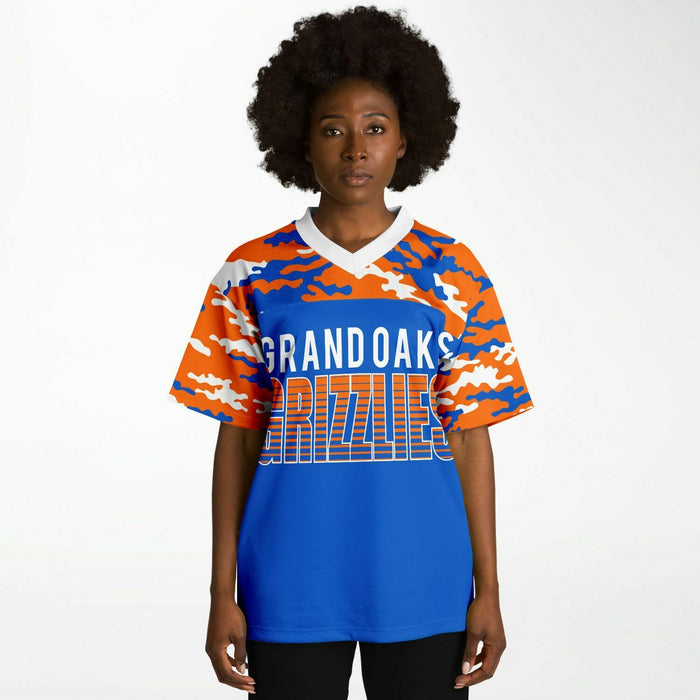 Black woman wearing Grand Oaks Grizzlies football Jersey