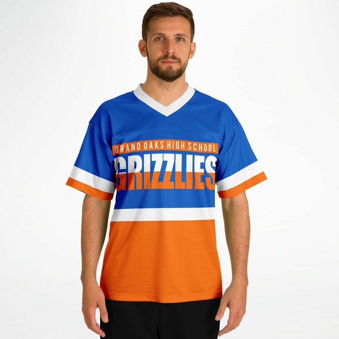 Man wearing Grand Oaks Grizzlies football jersey