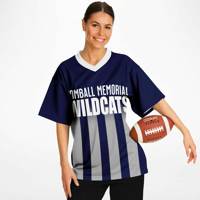 Woman wearing Tomball Memorial Wildcats High School football jersey