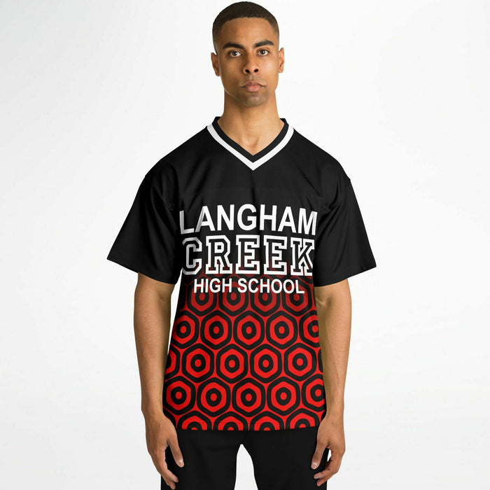 Black man wearing Langham Creek Lobos football Jersey