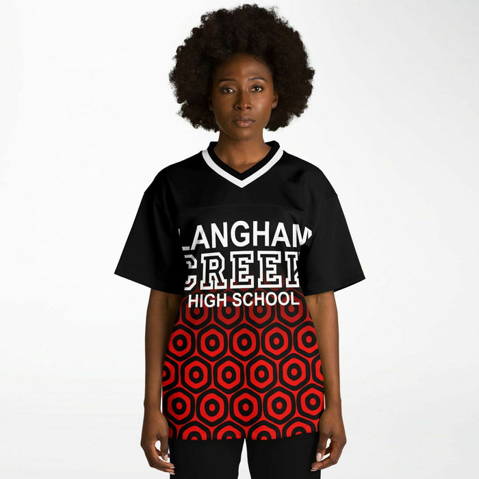 Black woman wearing Langham Creek Lobos football Jersey