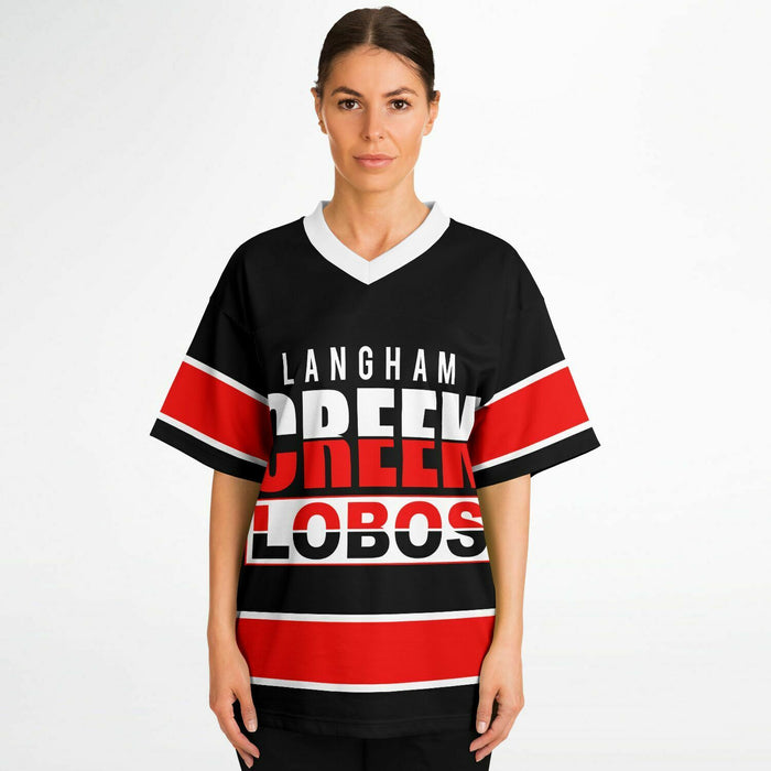 Women wearing Langham Creek Lobos football jersey