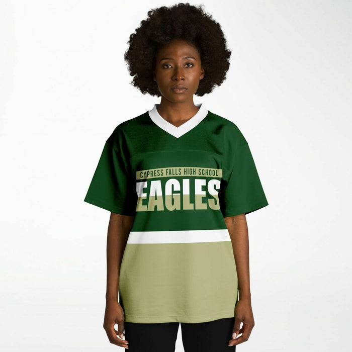 Black woman wearing Cypress Falls Eagles football Jersey 10