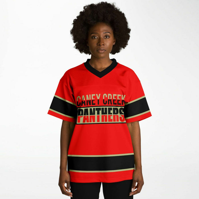 Black woman wearing Caney Creek Panthers football Jersey 13