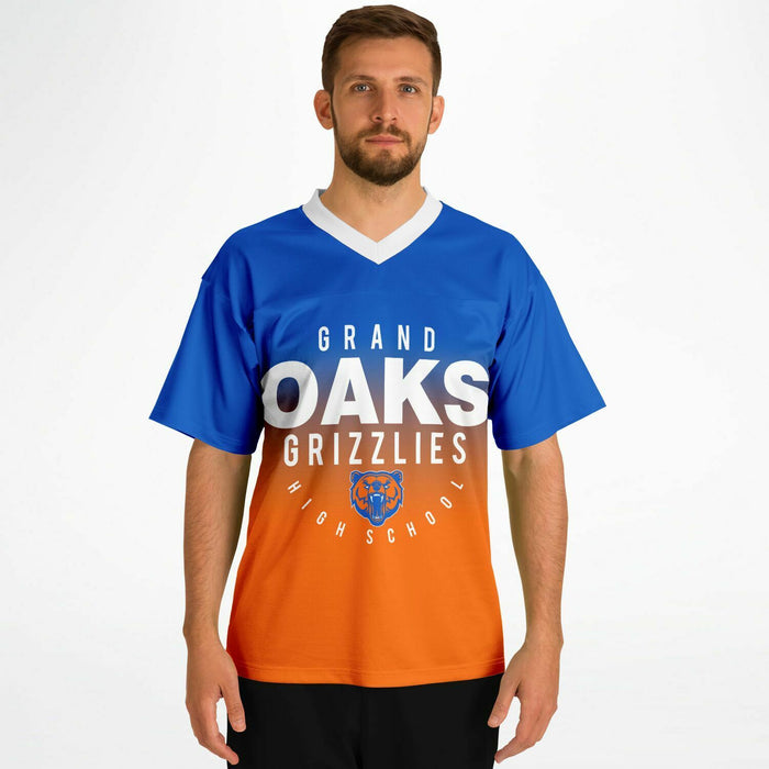 Man wearing Grand Oaks Grizzlies football jersey