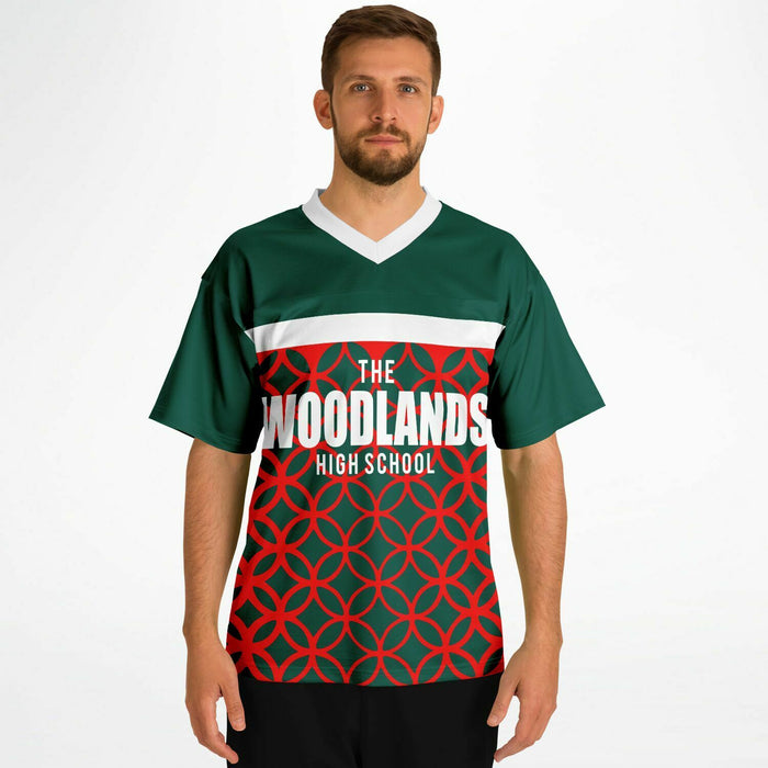 Man wearing The Woodlands Highlanders High School football jersey