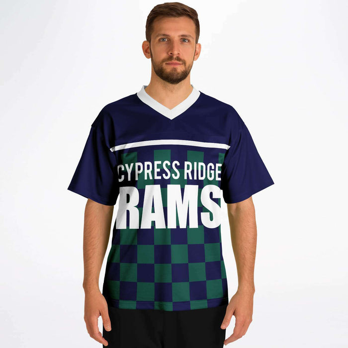 Man wearing Cypress Ridge Rams football jersey