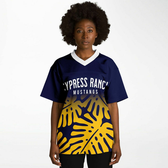 Black woman wearing Cypress Ranch Mustangs football Jersey