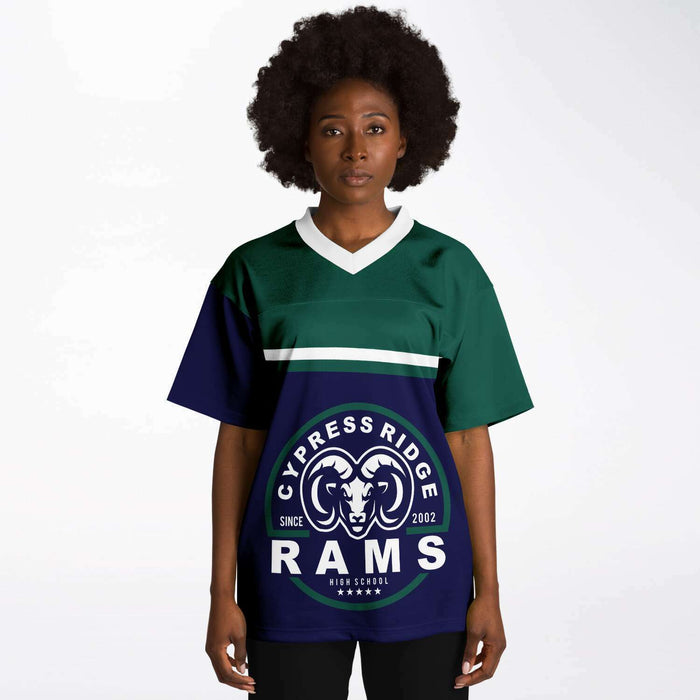 Black woman wearing Cypress Ridge Rams football Jersey