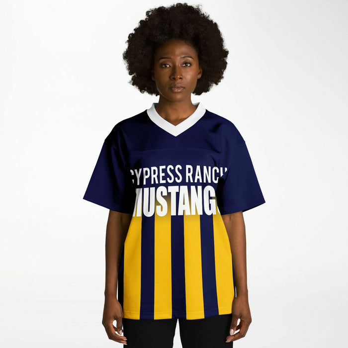 Black woman wearing Cypress Ranch Mustangs football Jersey