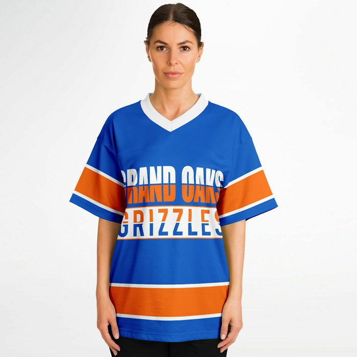 Women wearing Grand Oaks Grizzlies football jersey