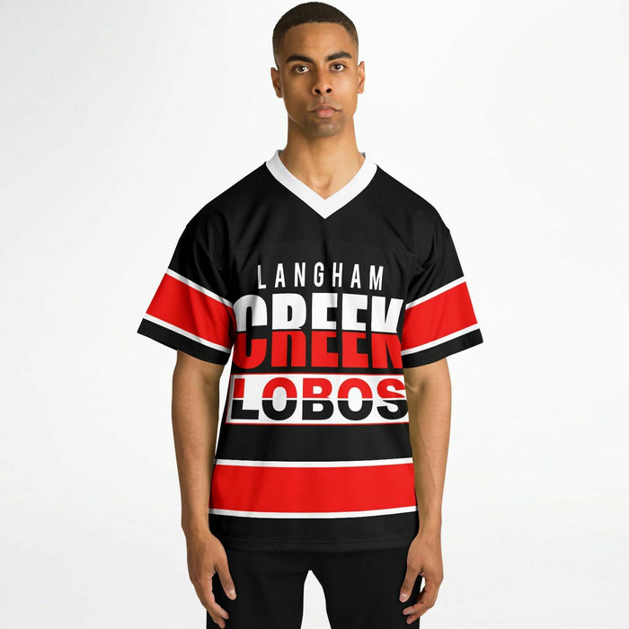 Black man wearing Langham Creek Lobos football Jersey