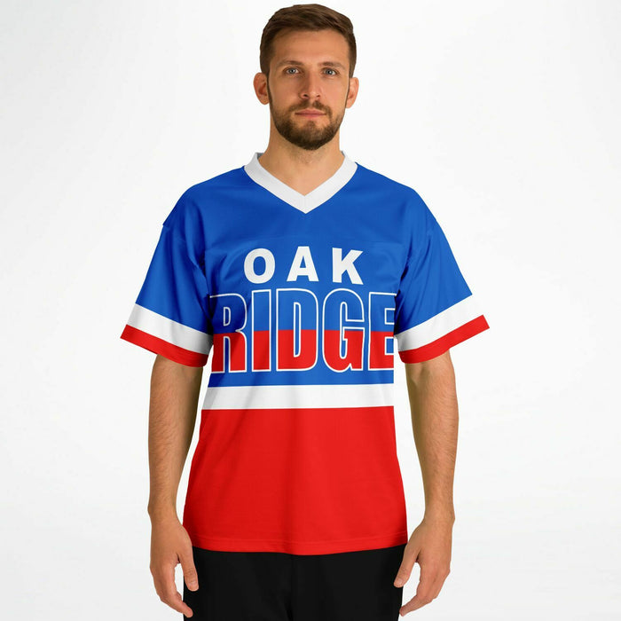 Man wearing Oak Ridge War Eagles High School football jersey