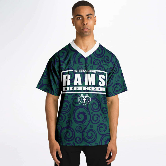 Black man wearing Cypress Ridge Rams football Jersey