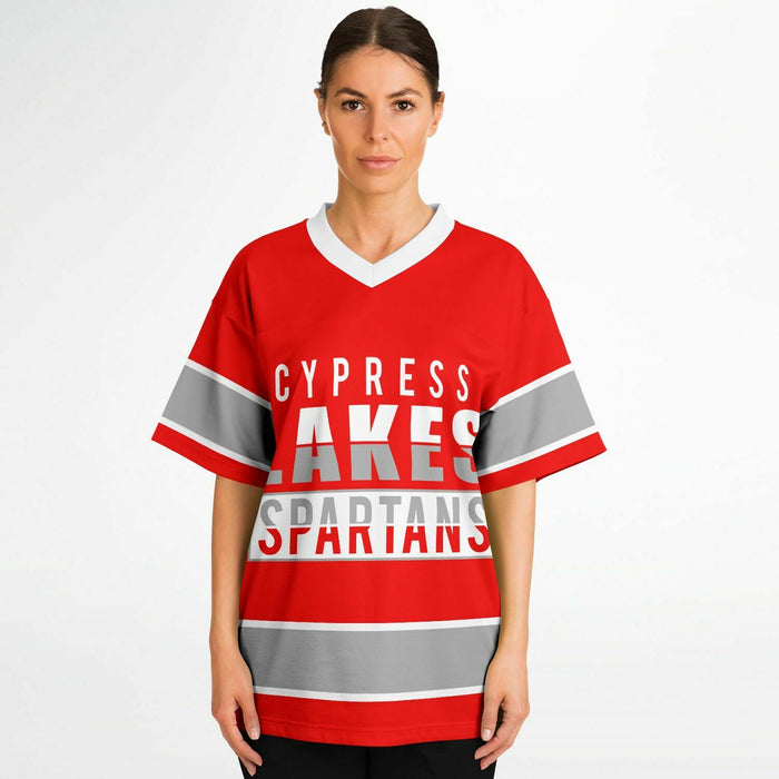 Women wearing Cypress Lakes Spartans football jersey