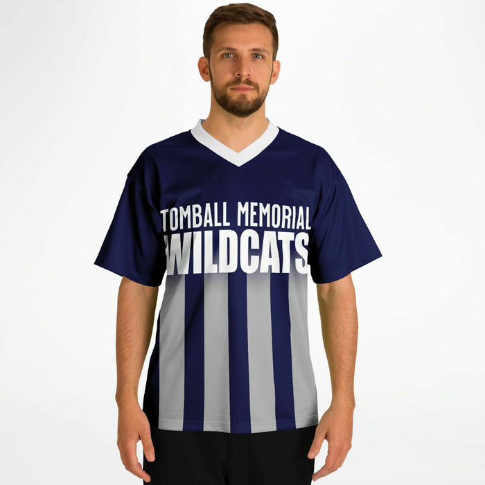 Man wearing Tomball Memorial Wildcats High School football jersey