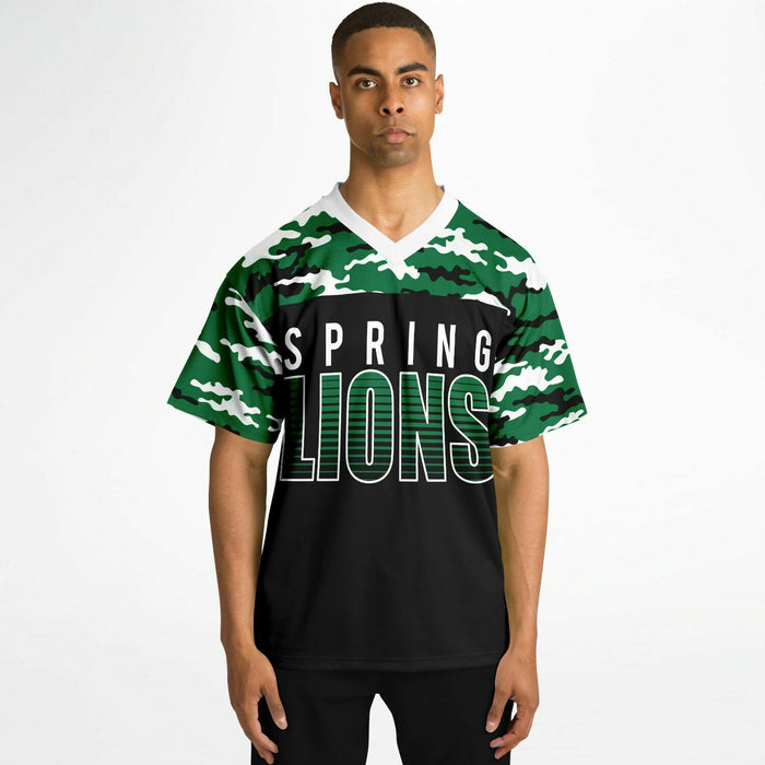 Black man wearing Spring Lions High School football Jersey