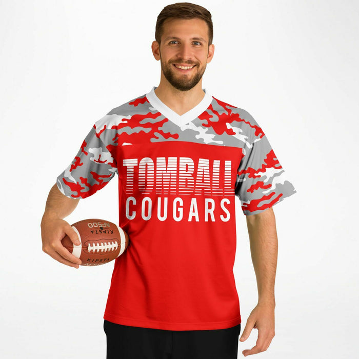 Man wearing Tomball Cougars High School football Jersey