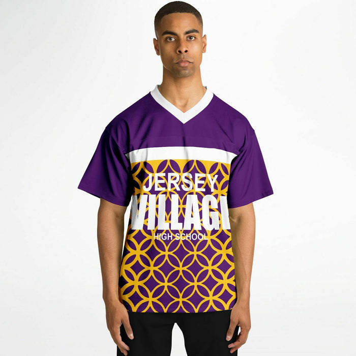 Black man wearing  Jersey Village Falcons football Jersey