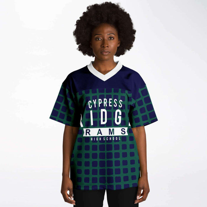 Black woman wearing Cypress Ridge Rams football Jersey