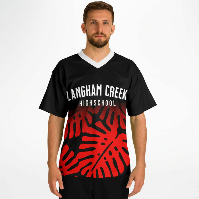 Man wearing Langham Creek Lobos football jersey