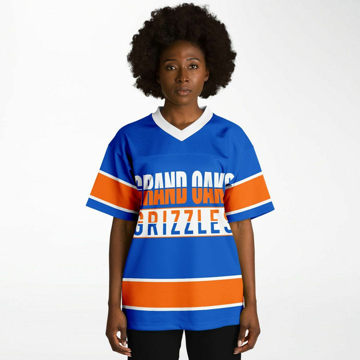 Black woman wearing Grand Oaks Grizzlies football Jersey