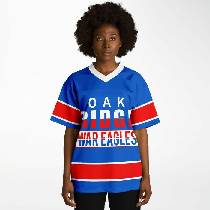 Black woman wearing Oak Ridge War Eagles High School football Jersey