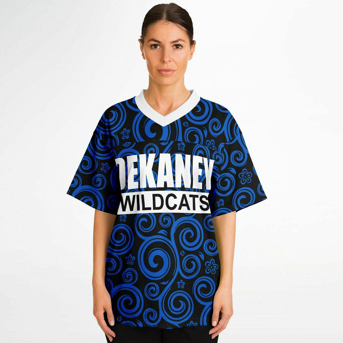 Women wearing Dekaney Wildcats football jersey