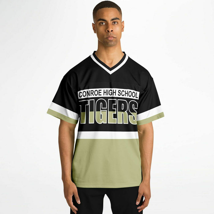 Black man wearing Conroe Tigers football Jersey 10