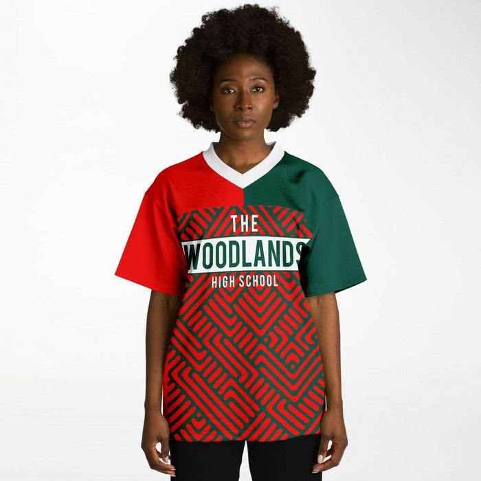 Black woman wearing The Woodlands Highlanders High School football Jersey