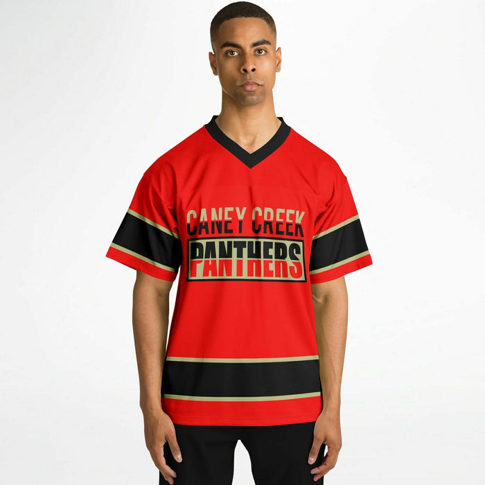 Black Man wearing Caney Creek Panthers football jersey 13